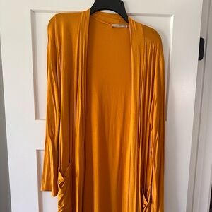 Mustard yellow long sleeve, knee length cardigan